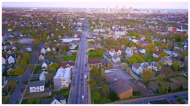 The near North Side of Milwaukee from the air, block after block of houses running down to the downtown skyline.